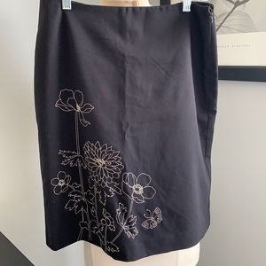 Black skirt with ecru stitching